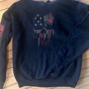 Navy Pullover Hoodie with Distressed American Flag Skull Graphic